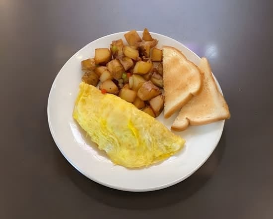 Tortilla Con Queso American Con Papas Casera / American Cheese Omelette with Home Fries.